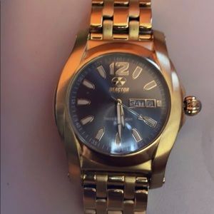 retractor watch gold